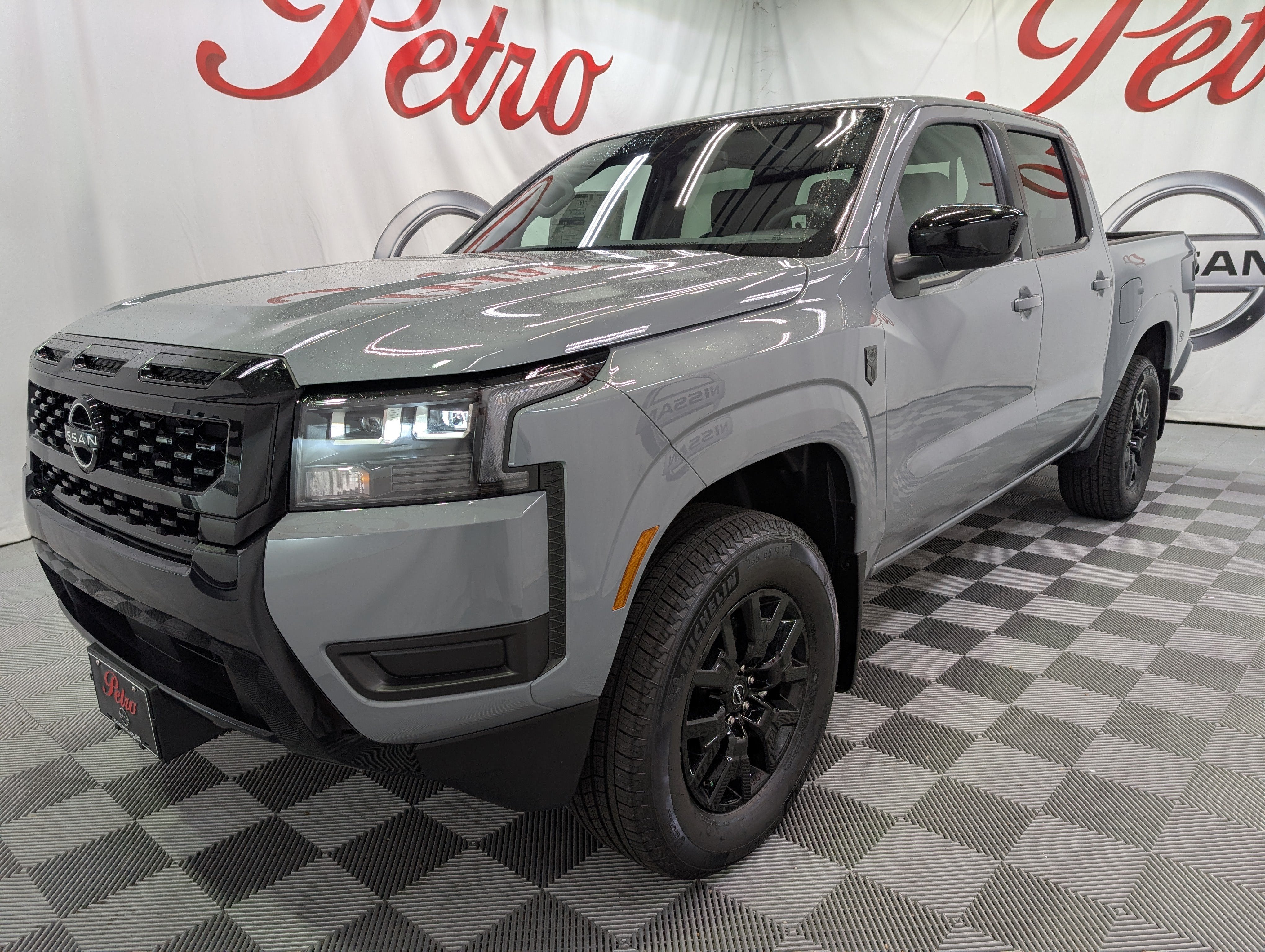 2026 Nissan Frontier SV in Boulder Gray Pearl — front three-quarter view