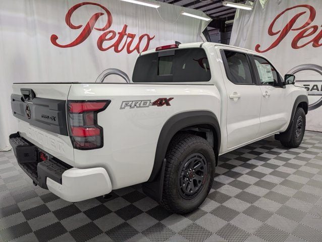 2026 Nissan Frontier — rear three-quarter view