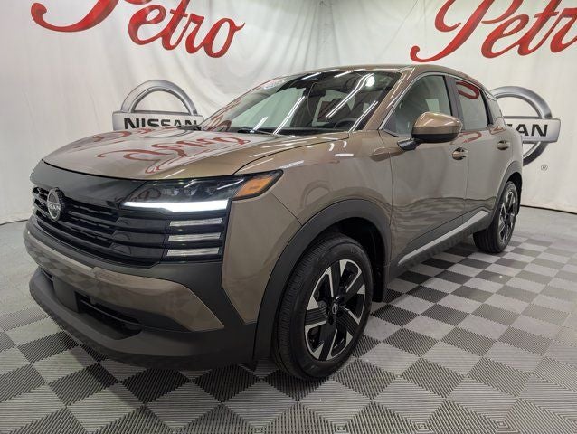 2025 Nissan Kicks SV in Canyon Bronze Metallic — front three-quarter view